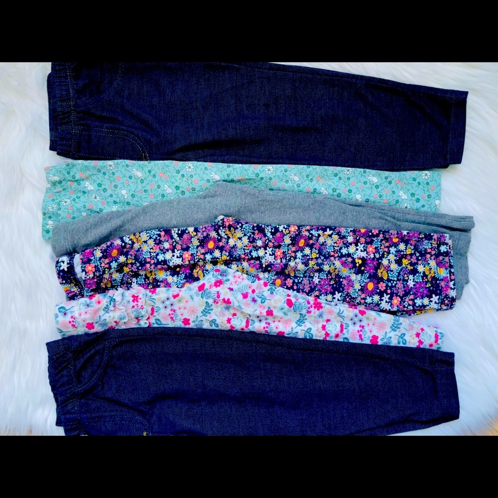 6 pairs of pants. 5 Carter’s and 1 First Impressions. 24 M & 1 pair 2T. Flowers